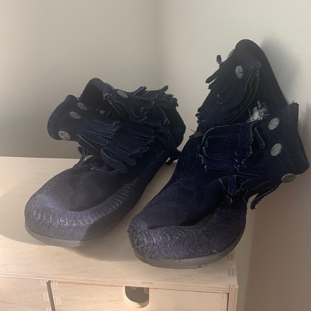 Navy moccasin-like ankle boots